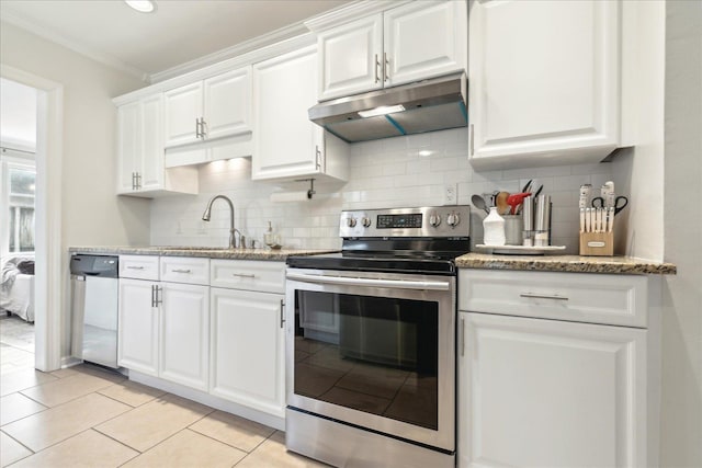 kitchen featuring stainless steel appliances, decorative backsplash, and white cabinetry