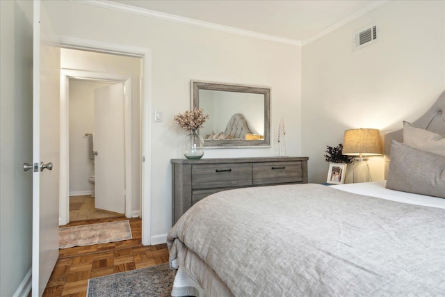 bedroom featuring dark parquet flooring and crown molding