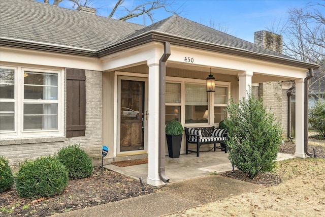 doorway to property with a porch