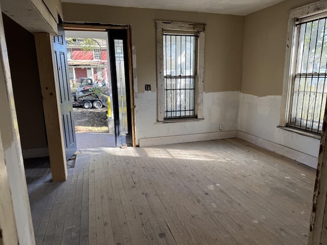 foyer entrance with light hardwood / wood-style floors