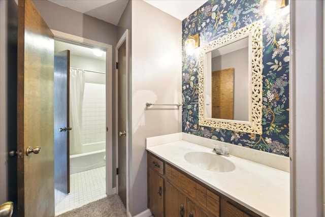 full bathroom with shower / bath combo with shower curtain, tile patterned floors, toilet, and vanity