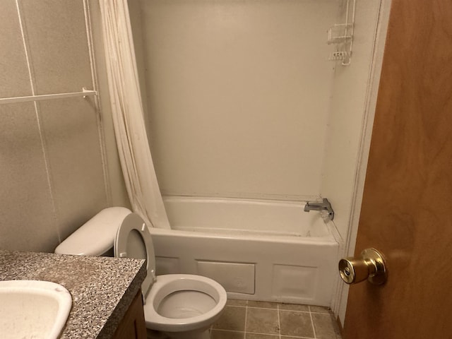 bathroom with tile patterned floors, vanity, and toilet