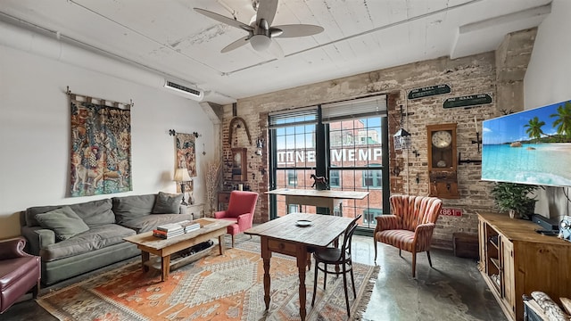 living area with ceiling fan and concrete flooring