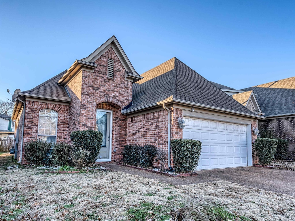 view of property featuring a garage