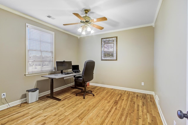 office space featuring light hardwood / wood-style floors, ceiling fan, and ornamental molding