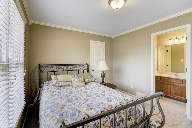 carpeted bedroom featuring sink, connected bathroom, and ornamental molding