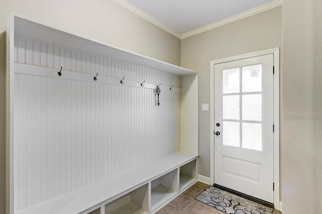 mudroom featuring crown molding and tile patterned floors