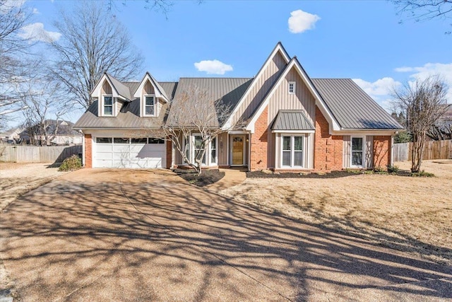 view of front of home with a garage