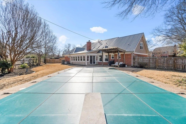 view of swimming pool with a patio