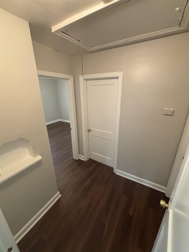 hallway featuring dark hardwood / wood-style floors