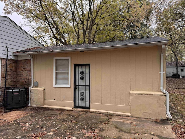 entrance to property featuring central AC unit