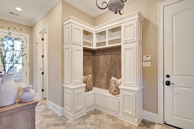 mudroom featuring ornamental molding