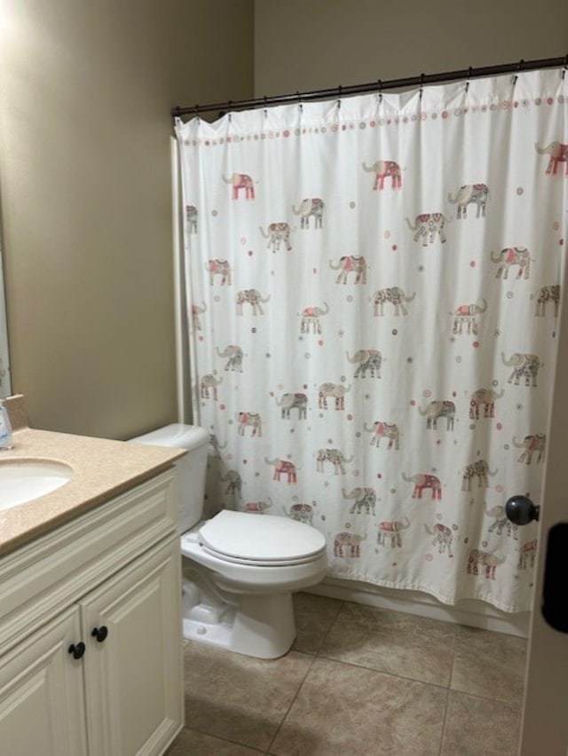 full bathroom featuring toilet, shower / tub combo, tile patterned floors, and vanity