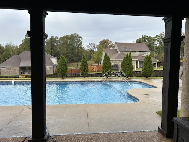 view of pool featuring a patio and pool water feature