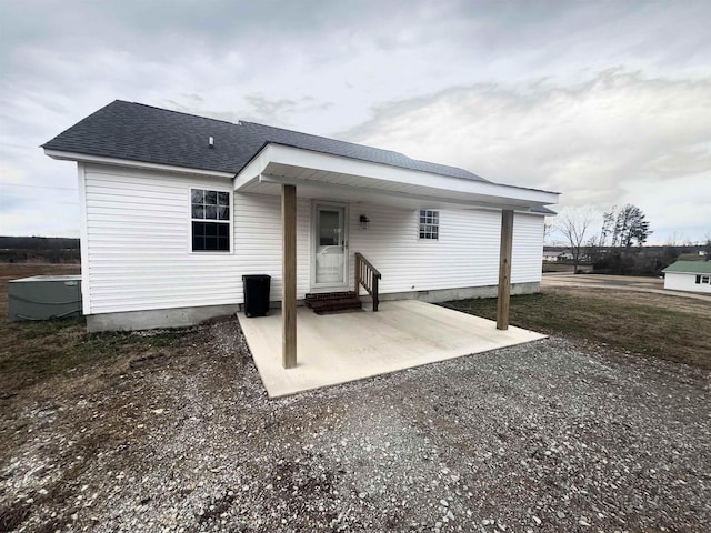 rear view of house featuring a patio area