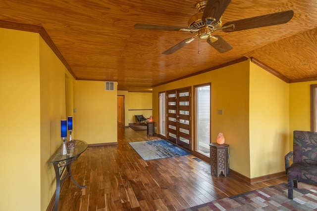 entrance foyer with wood ceiling, hardwood / wood-style flooring, ceiling fan, and ornamental molding