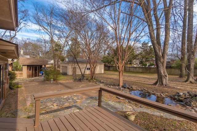 deck featuring a storage shed