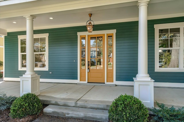 property entrance featuring a porch