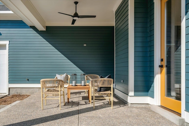 view of patio featuring ceiling fan