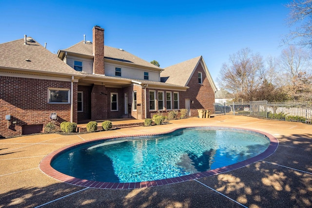 view of swimming pool featuring a patio