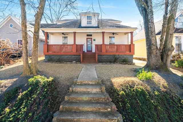 bungalow featuring covered porch and ceiling fan