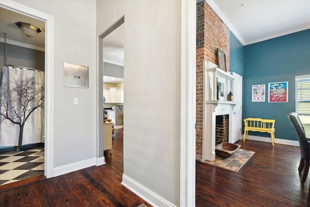 corridor featuring dark hardwood / wood-style flooring and crown molding