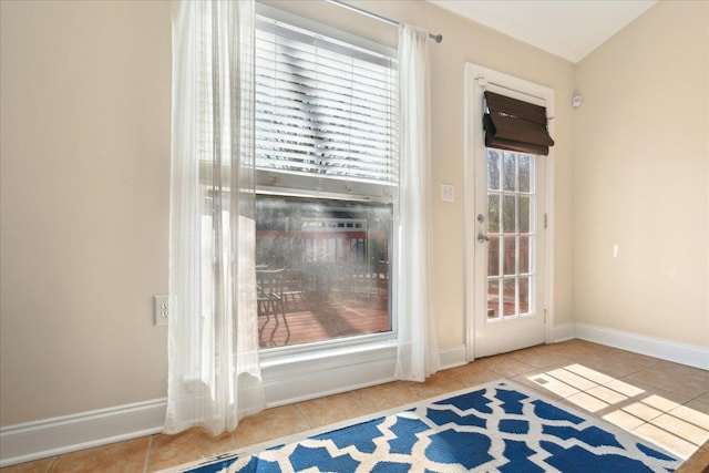 entryway featuring light tile patterned floors