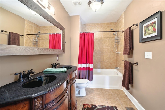 full bathroom featuring toilet, vanity, shower / bath combo, and tile patterned flooring