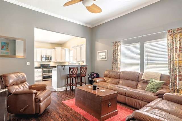 living room featuring ornamental molding, ceiling fan, and dark hardwood / wood-style flooring