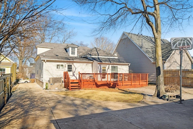 rear view of property with a deck