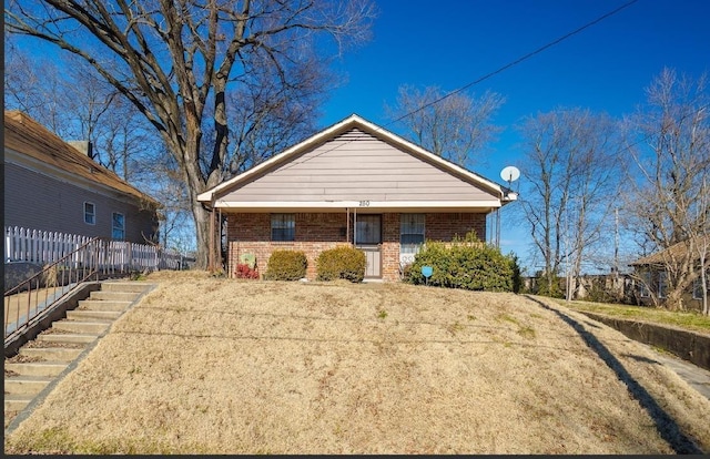 view of front of property with a front lawn