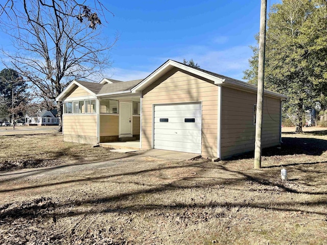 exterior space with a garage