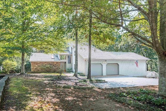 view of front of property with a garage