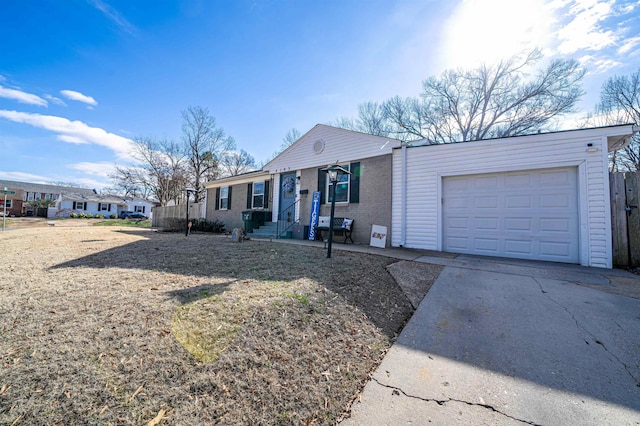 ranch-style house featuring a garage