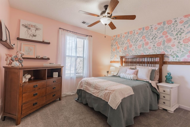 bedroom with light carpet and ceiling fan