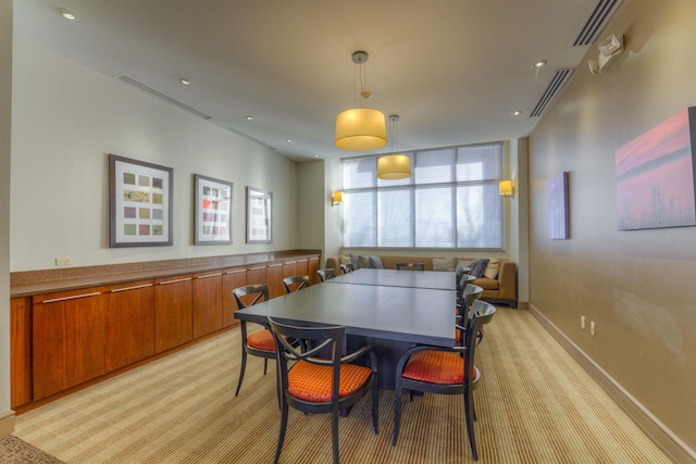 dining area with light carpet