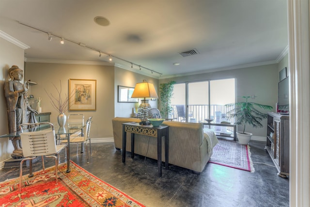 living room featuring crown molding and rail lighting