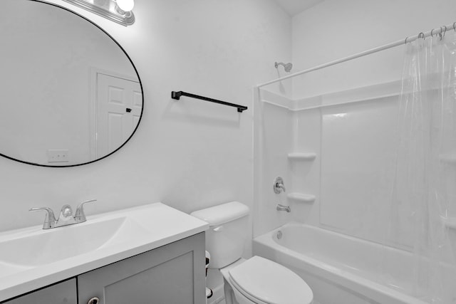 full bathroom featuring shower / bath combo with shower curtain, toilet, and vanity