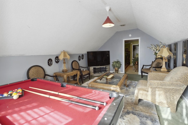 recreation room featuring vaulted ceiling, carpet, a textured ceiling, and pool table