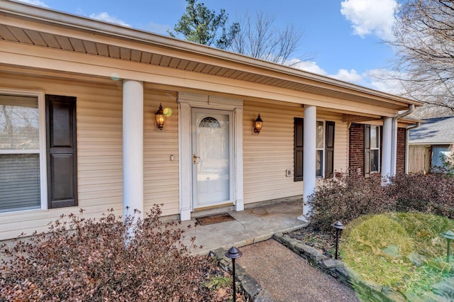 doorway to property featuring a porch