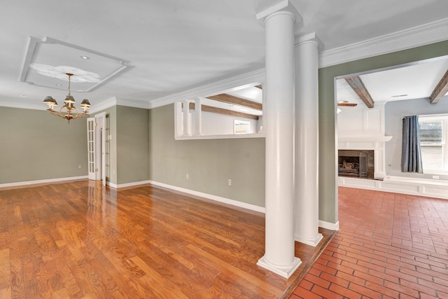 interior space featuring ornamental molding and an inviting chandelier