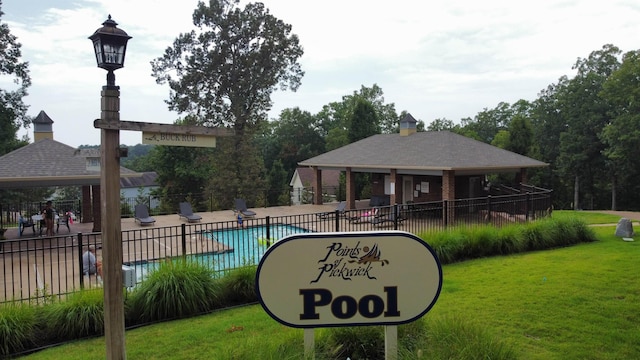 view of pool featuring a gazebo and a yard