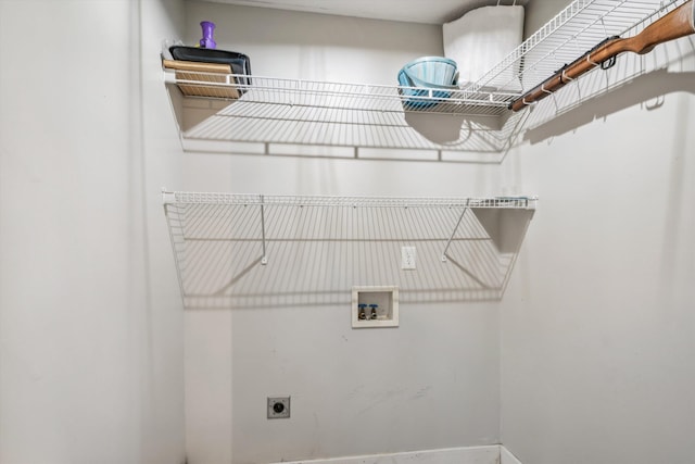 clothes washing area with hookup for a washing machine and electric dryer hookup