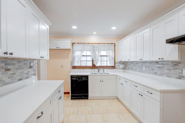 kitchen with decorative backsplash, sink, white cabinets, and black dishwasher