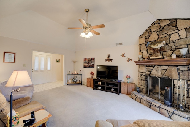 living room with light carpet, vaulted ceiling, and ceiling fan