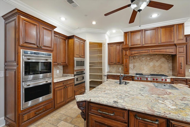 kitchen with ornamental molding, light stone counters, tasteful backsplash, and stainless steel appliances