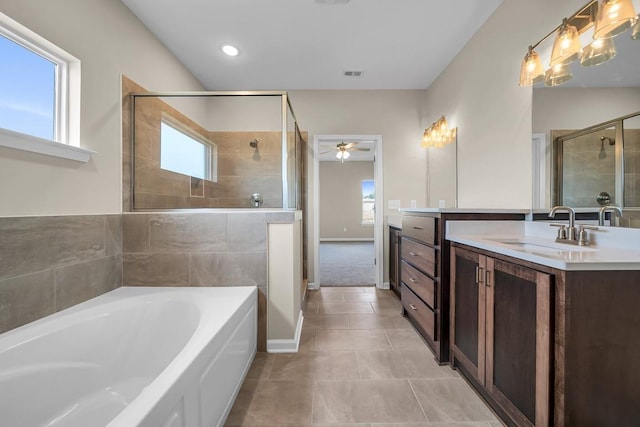 bathroom featuring ceiling fan, tile patterned floors, vanity, and separate shower and tub