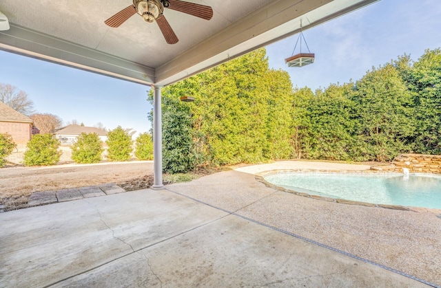 view of patio featuring ceiling fan