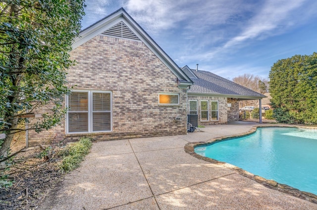 view of pool featuring a patio