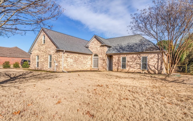 view of front of property with a front lawn